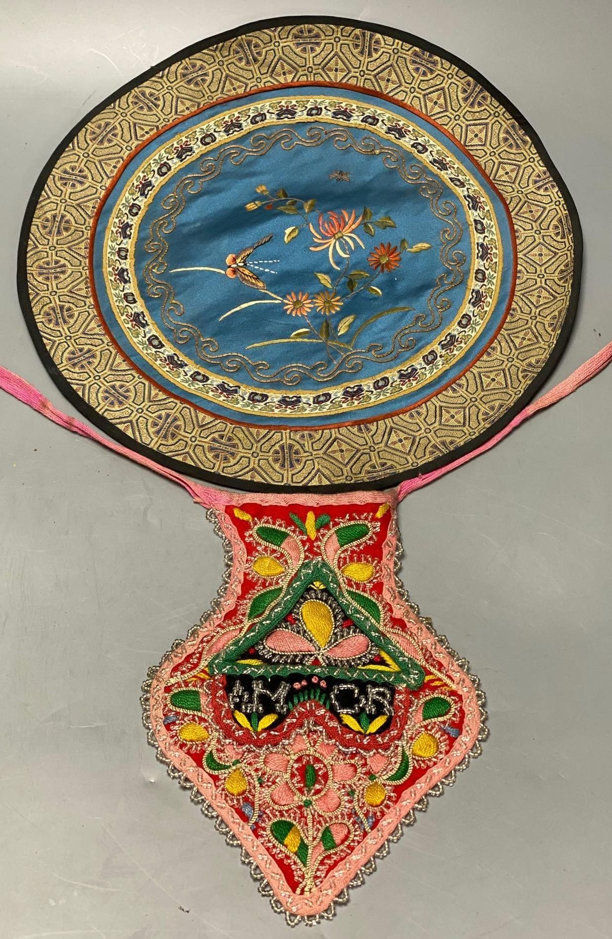 A collection of Chinese embroidered panels, a beaded Portuguese pocket, an Indian mirrored panel and a 19th century